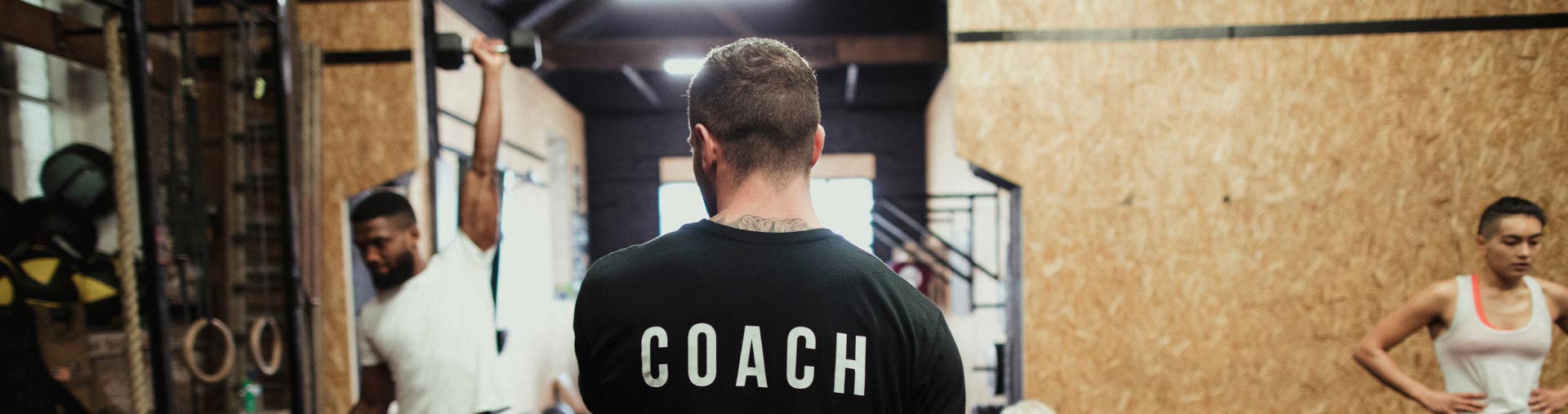 Sporty attractive woman training in a morning gym.